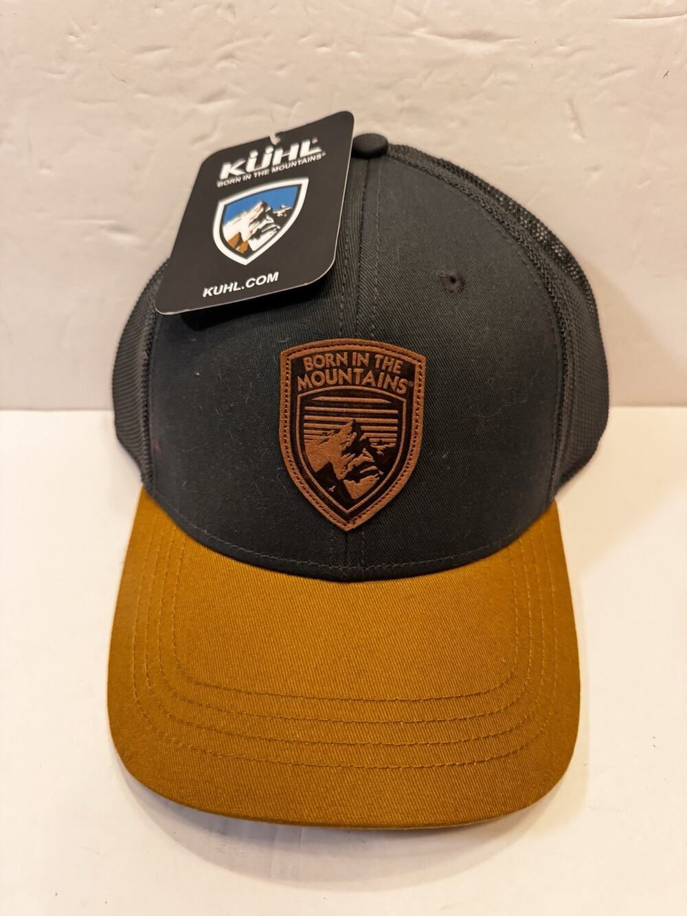 New Kuhl Mesh Snap Back Trucker Hat Leather Logo NWT